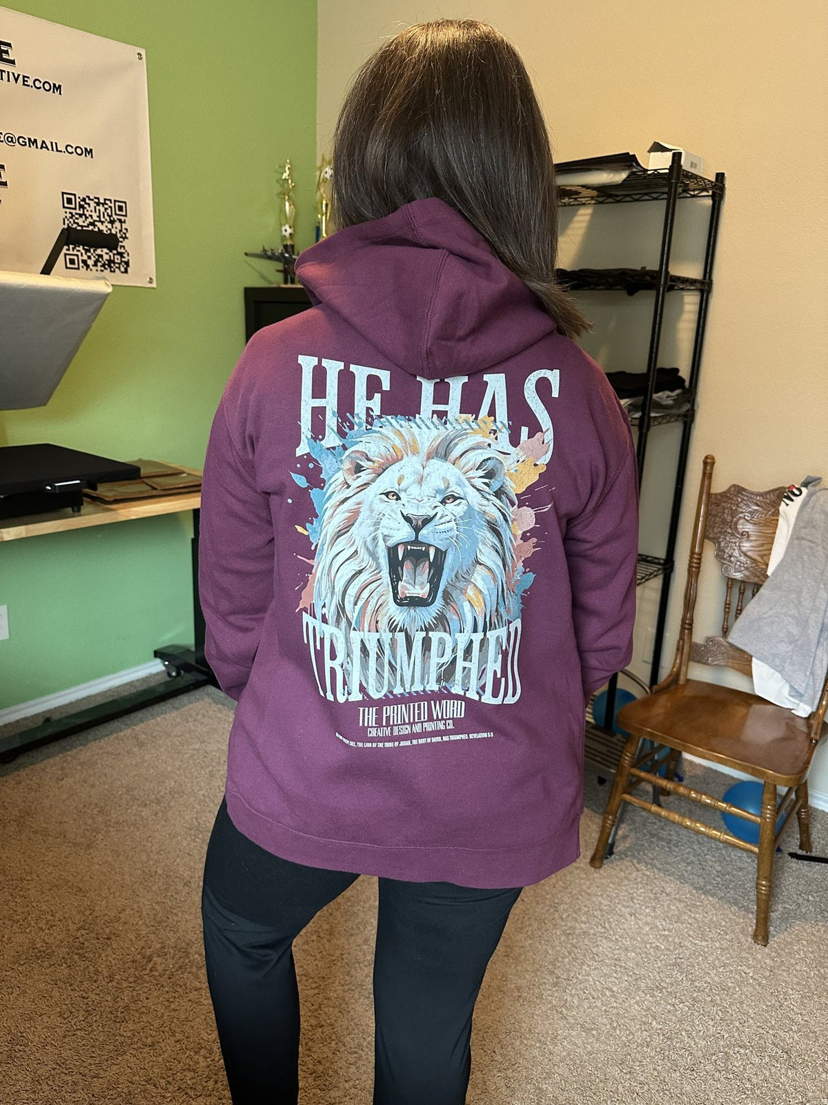 He Has Triumphed hoodie, back print, worn