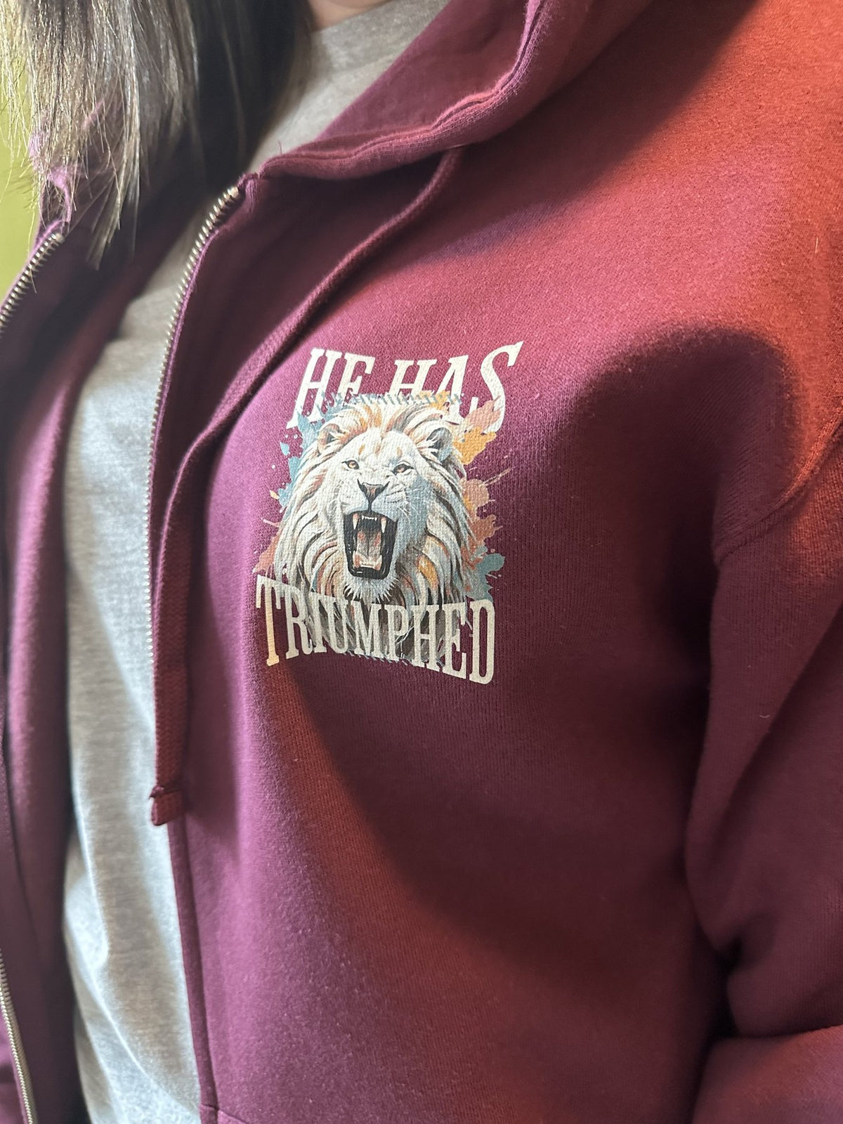 He Has Triumphed hoodie, front pocket print
